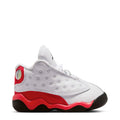 Toddler low-top sneaker in white with red and black accents, lace-up with perforated panel.