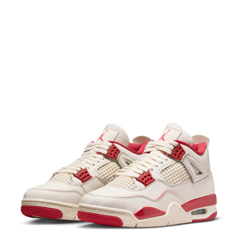 Pair of women's retro sneakers in pale ivory with red details, mesh uppers, and red sole