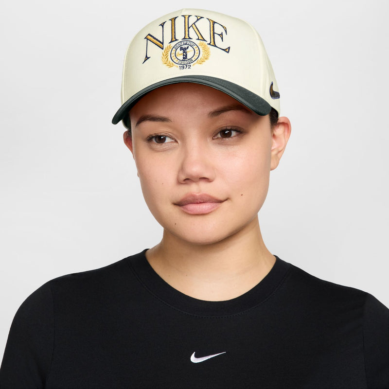 Nike Rise structured curved bill snapback cap in cream and dark green