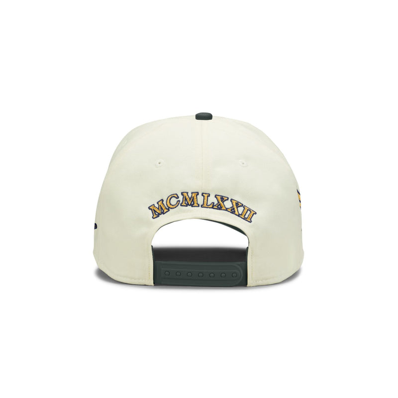 Sail snapback cap back with dark green adjust strap and MCM LXXII text.