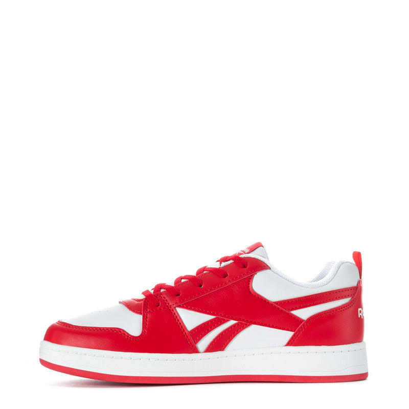 Youth red and white Reebok low-top sneakers, side view with lace-up