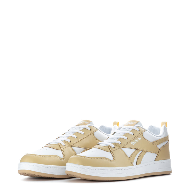 Pair of youth white and beige sneakers with lace-up closure and Reebok branding
