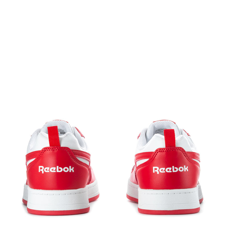 Youth red and white Reebok low-top sneakers, heel and logo detail