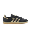 Samba OG women's low-top sneakers pair, black with gold stripes and light gum sole