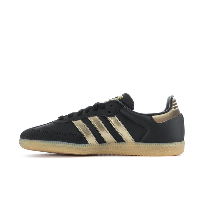 Samba OG women's low-top sneakers, black leather with gold-striped side and gum sole