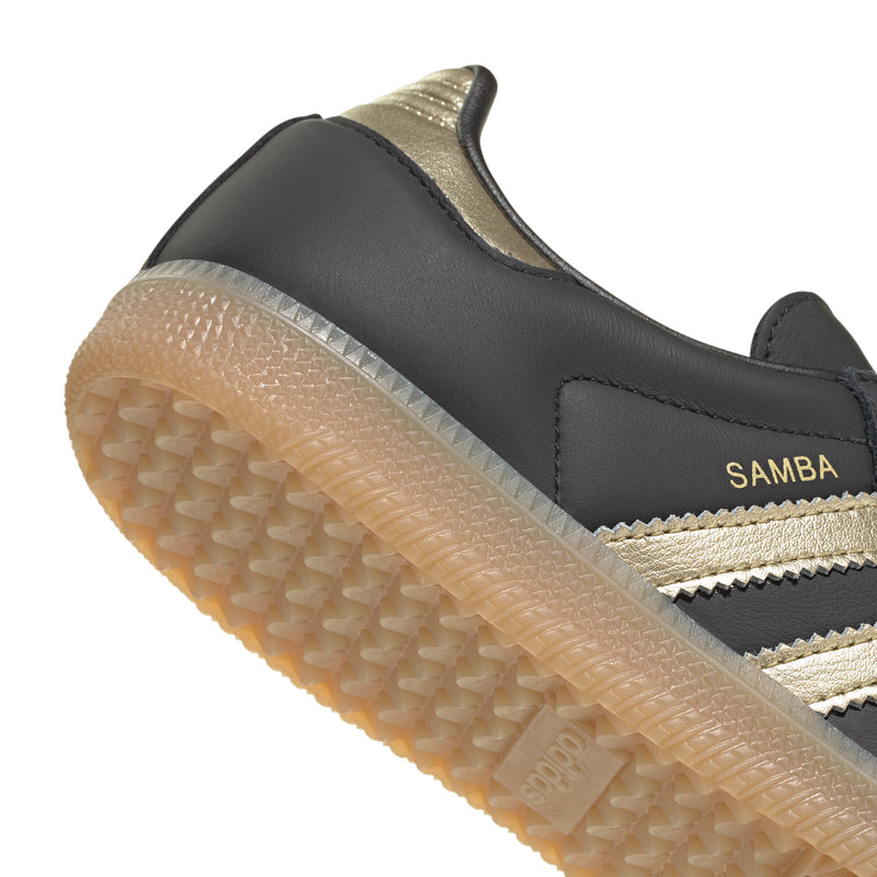 Samba OG women's sneaker heel and side, black upper with gold trim and gum outsole