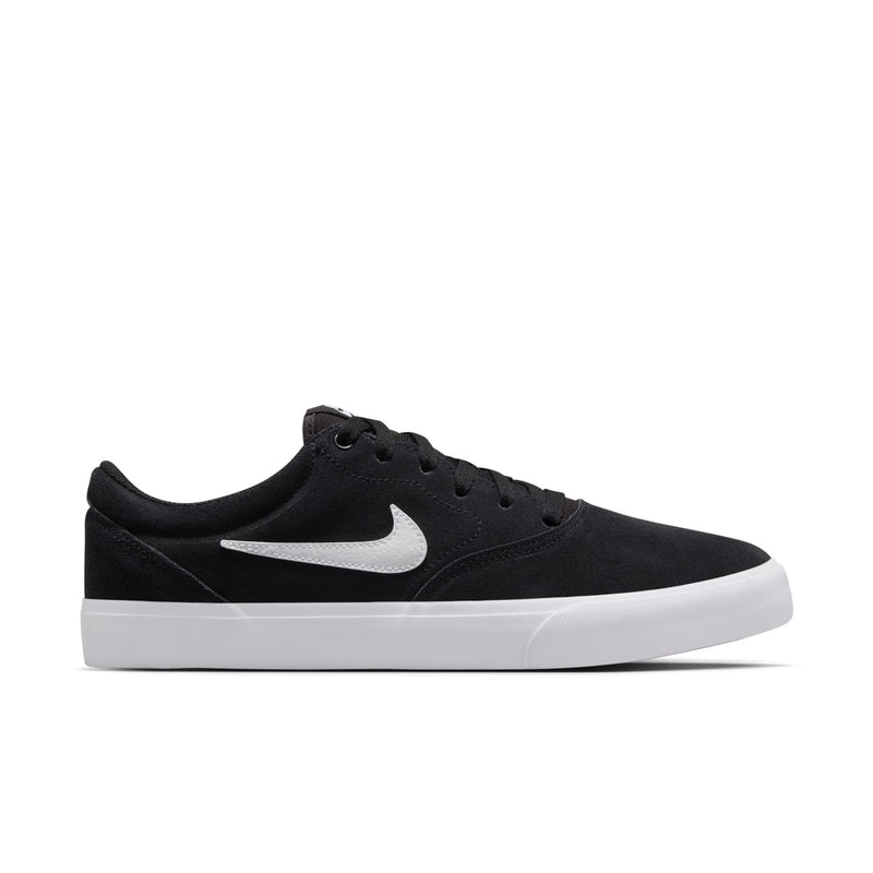 Men's black low-top skate sneaker, white Swoosh and midsole, side view on white.