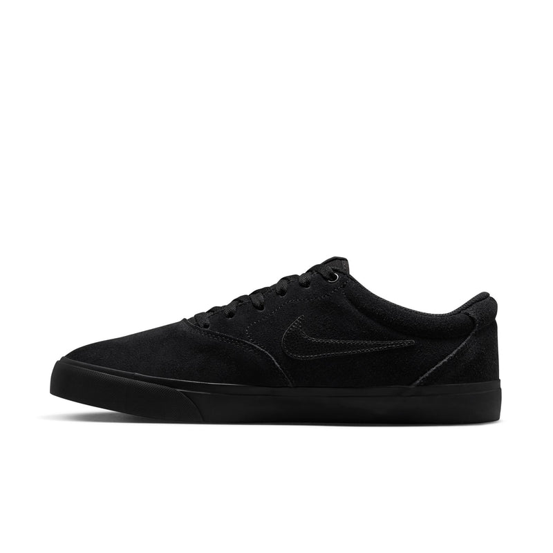 Black low-top skate sneaker with lace-up vamp and curved Swoosh branding.