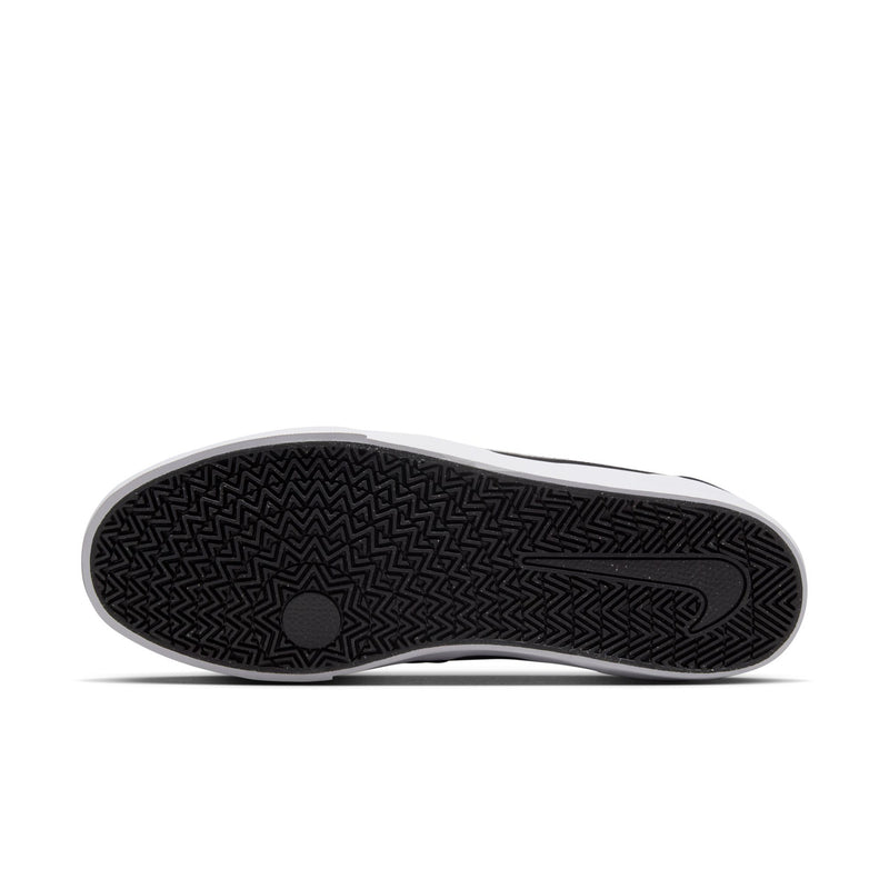 Men's black skate sneaker outsole with zigzag tread pattern and circular grip section.