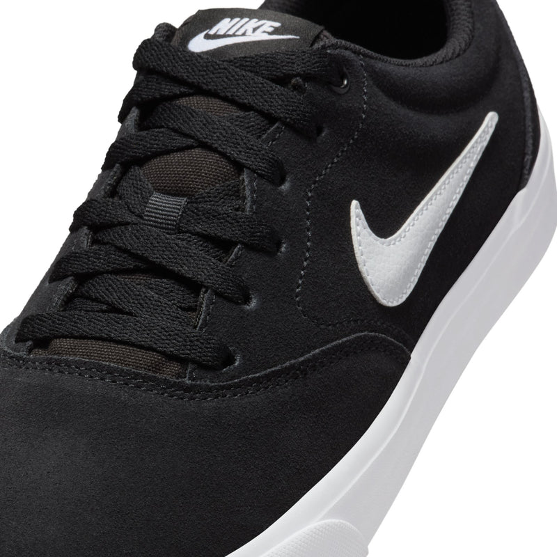 Men's black low-top skate sneaker upper with Nike Swoosh, black laces, padded collar.