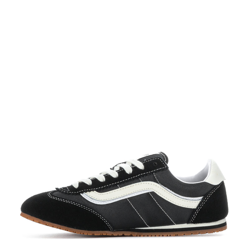 Women's low-top sneakers, black canvas with white stripe, lace-up front, gum sole