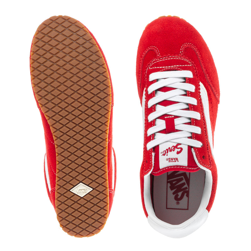 Racing red sneakers with white laces; gum outsole tread and padded heel