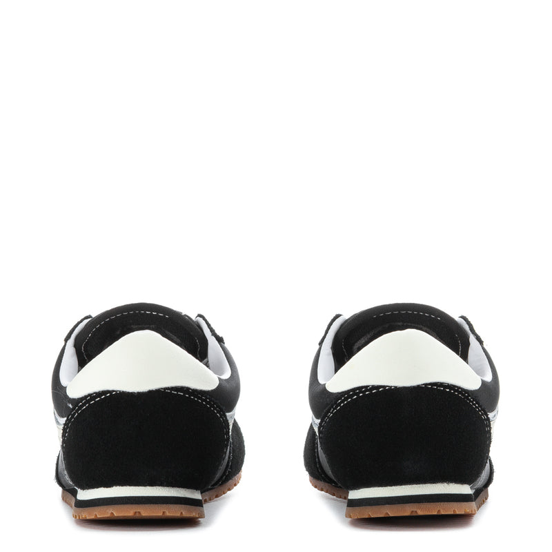 Women's low-top sneakers, black with white heel collar, lace-up, gum sole