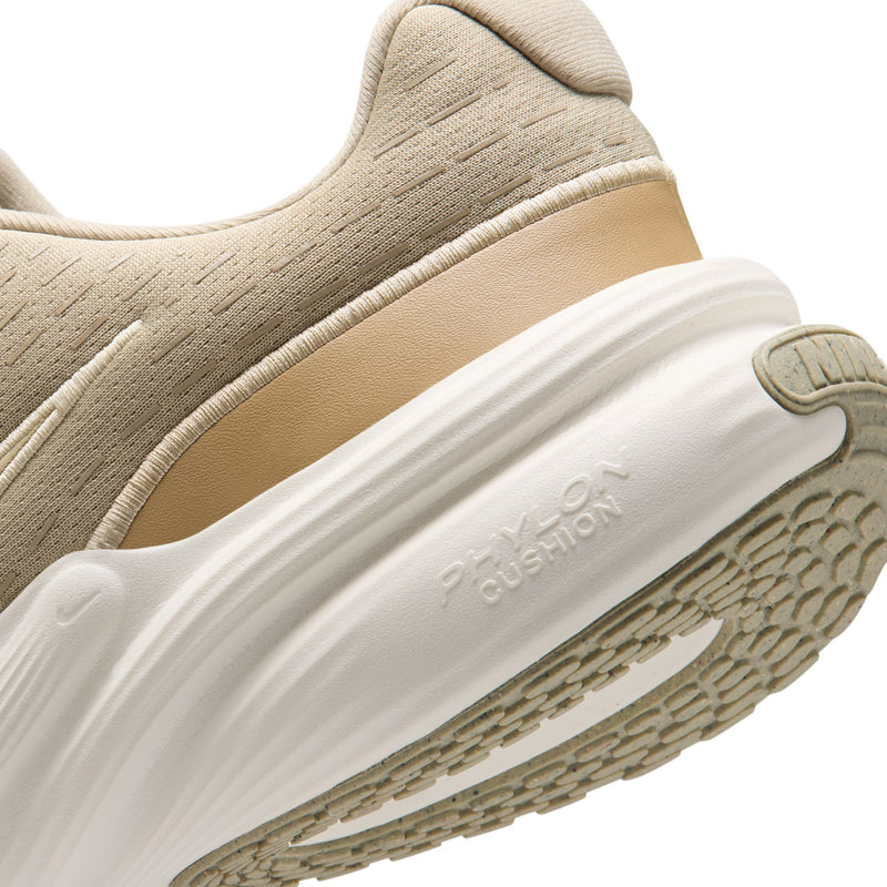 Beige shoe side with white midsole cushioning text and rubber tread detail.