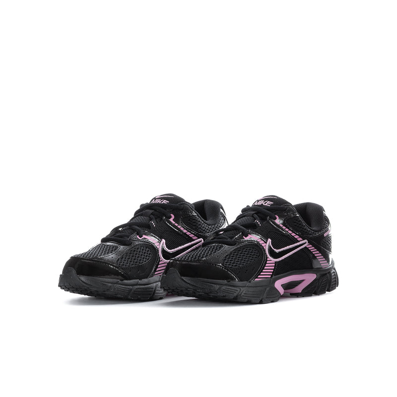 Youth running shoe, black with pink Swoosh and geometric side detail.