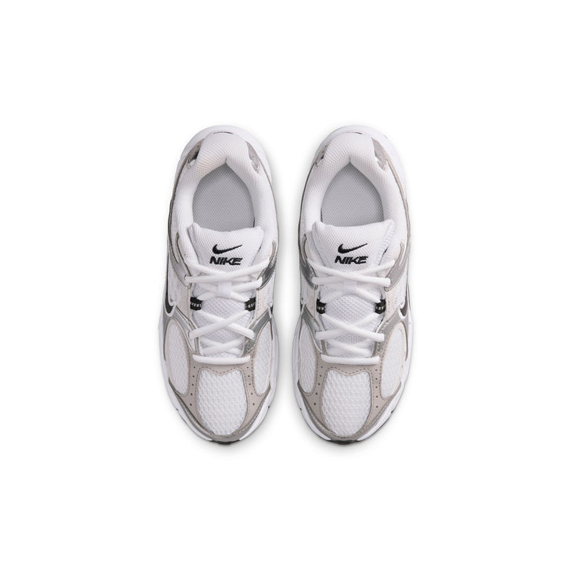Youth sneakers shown from front toe view; white and light gray with Nike branding