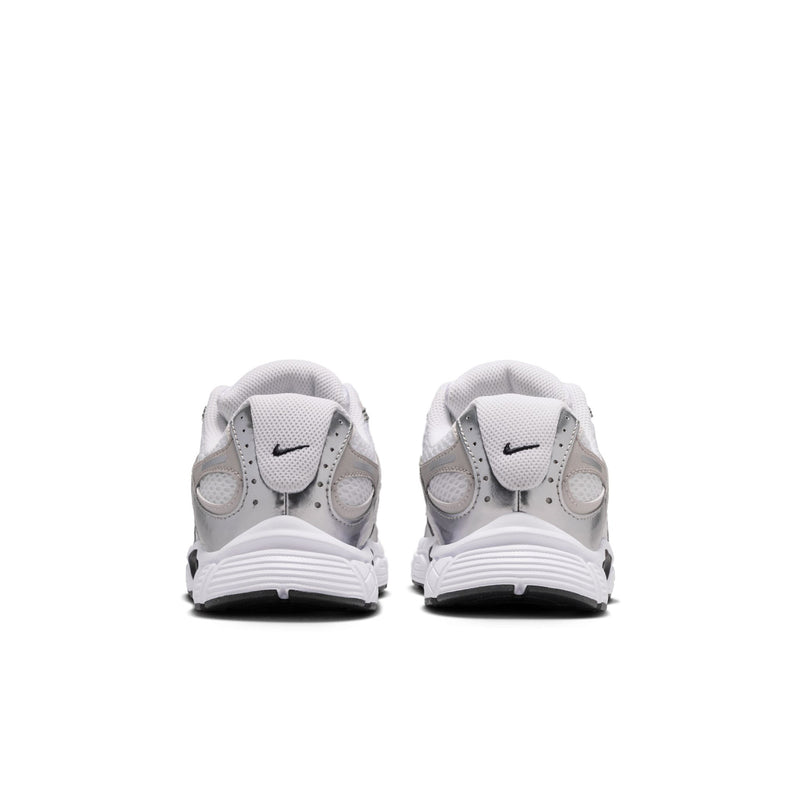 Youth sneakers from heel view, white and light gray uppers with black heel accents