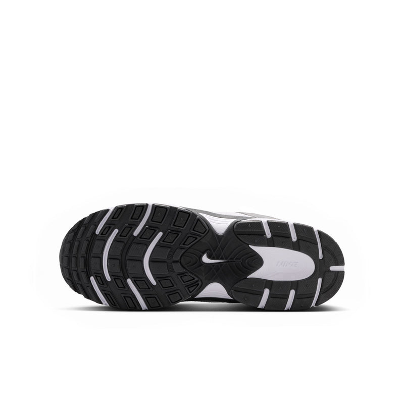 Youth sneaker outsole bottom view with black tread pattern on gray base