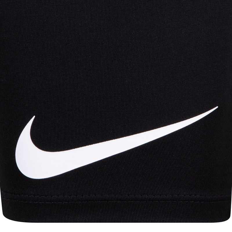 Black performance shorts with white Nike swoosh