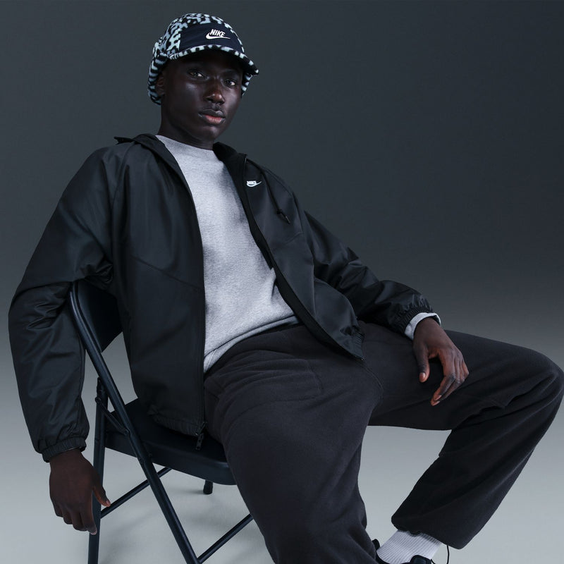 Men's black hooded windbreaker jacket with zip front, drawstring hood, and elastic hem