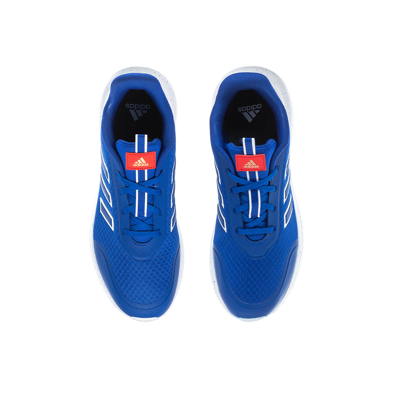 Youth sneakers top view: blue lace-up uppers with adidas logo on tongue.